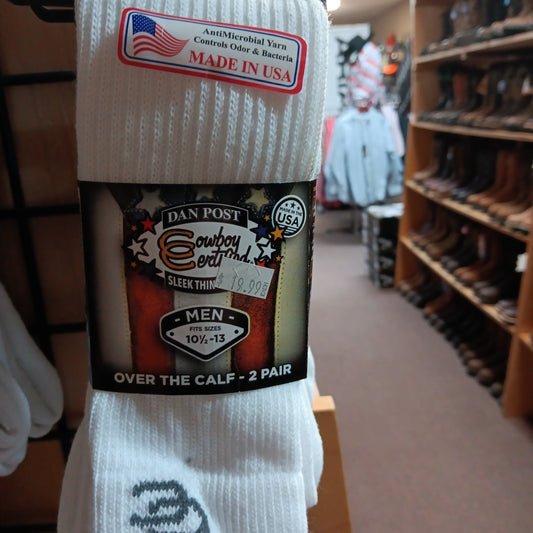 Cowboy crew over the calf